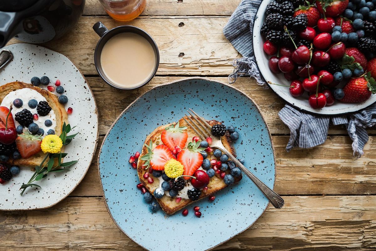 Breakfast table with fruit and pancakes